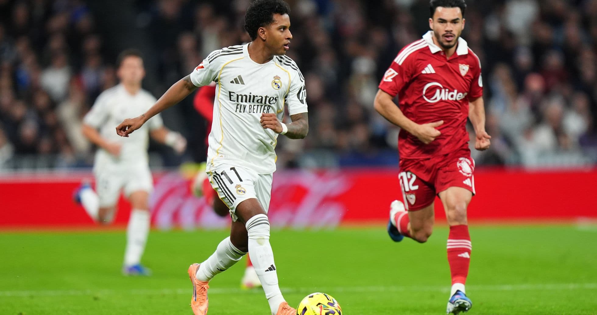 Player dribbling the ball during Sevilla vs Real Madrid Player dribbling the ball during Sevilla vs Real Madrid