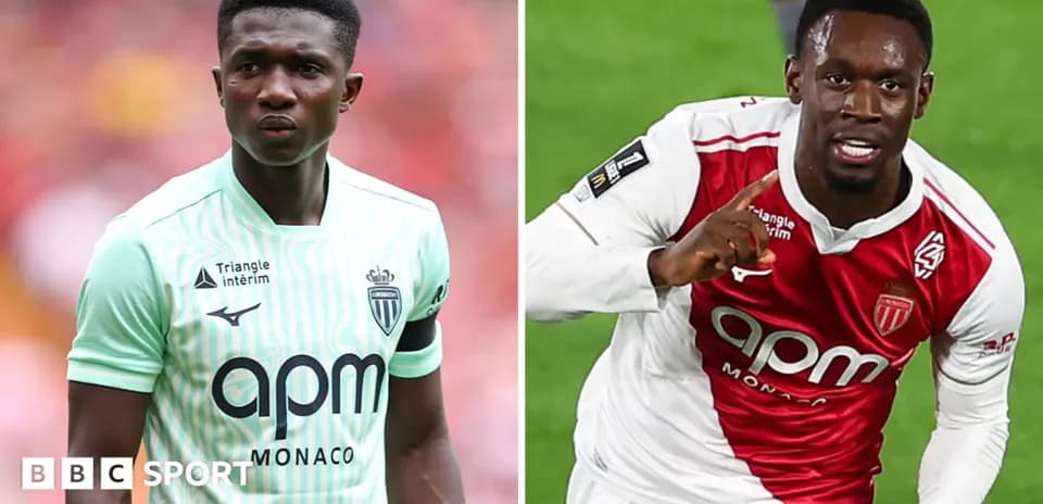 Two AS Monaco players in match uniforms Two AS Monaco players in match uniforms