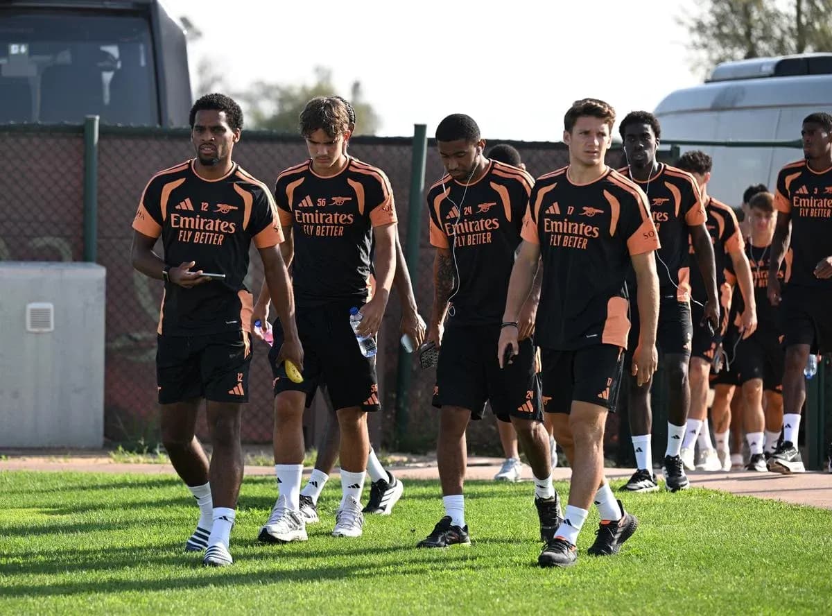 Arsenal players walking together during training session Arsenal players walking together during training session