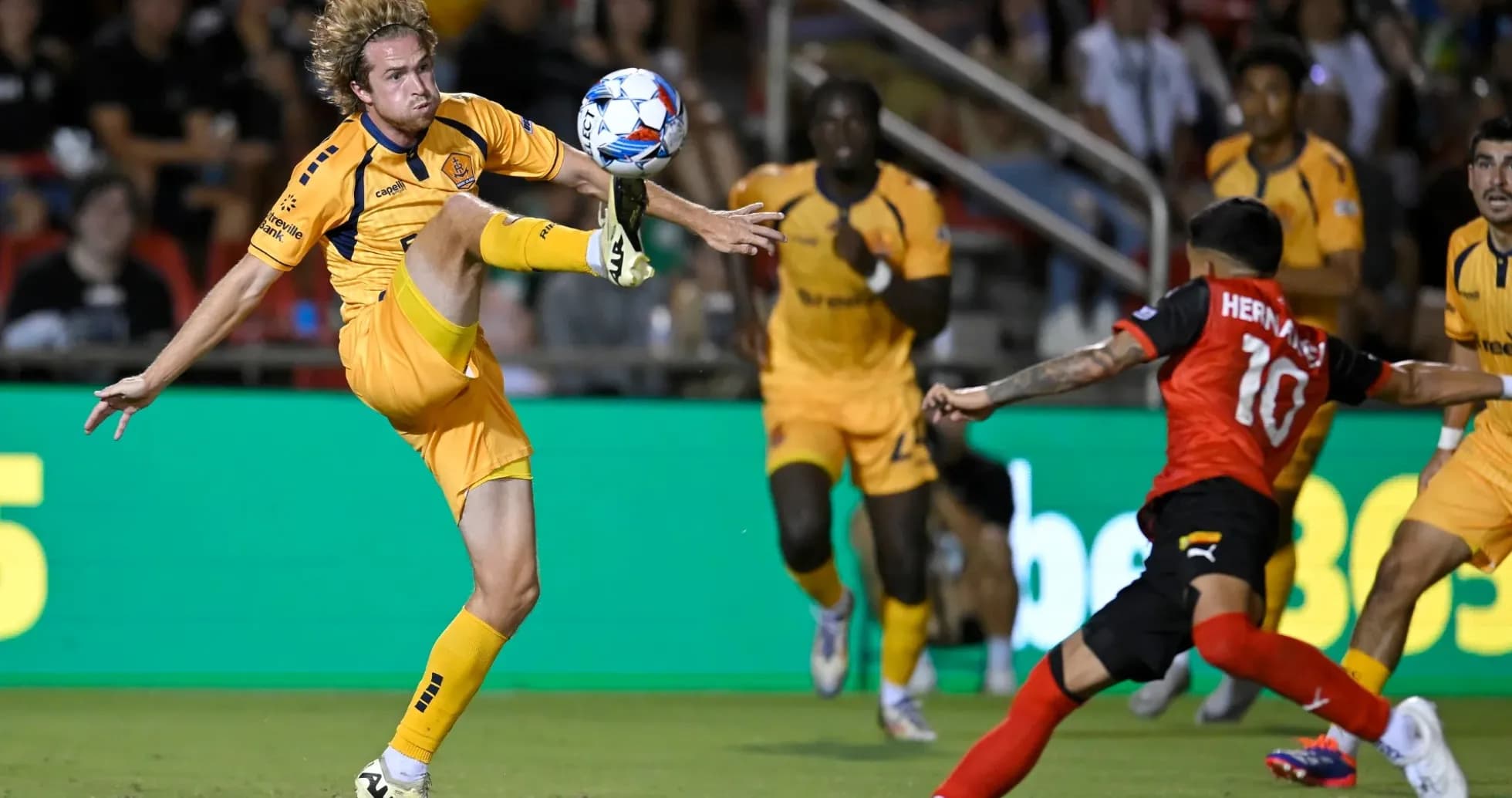 Player kicking ball during Indy Eleven match Player kicking ball during Indy Eleven match