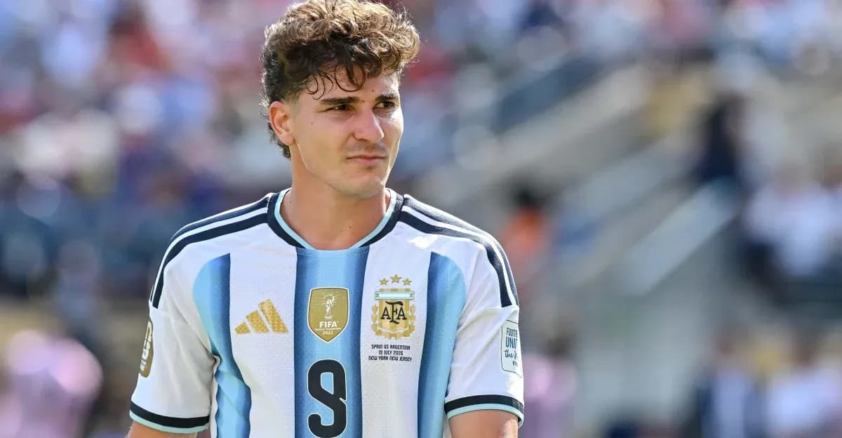 Argentinian player wearing national team jersey on field Argentinian player wearing national team jersey on field