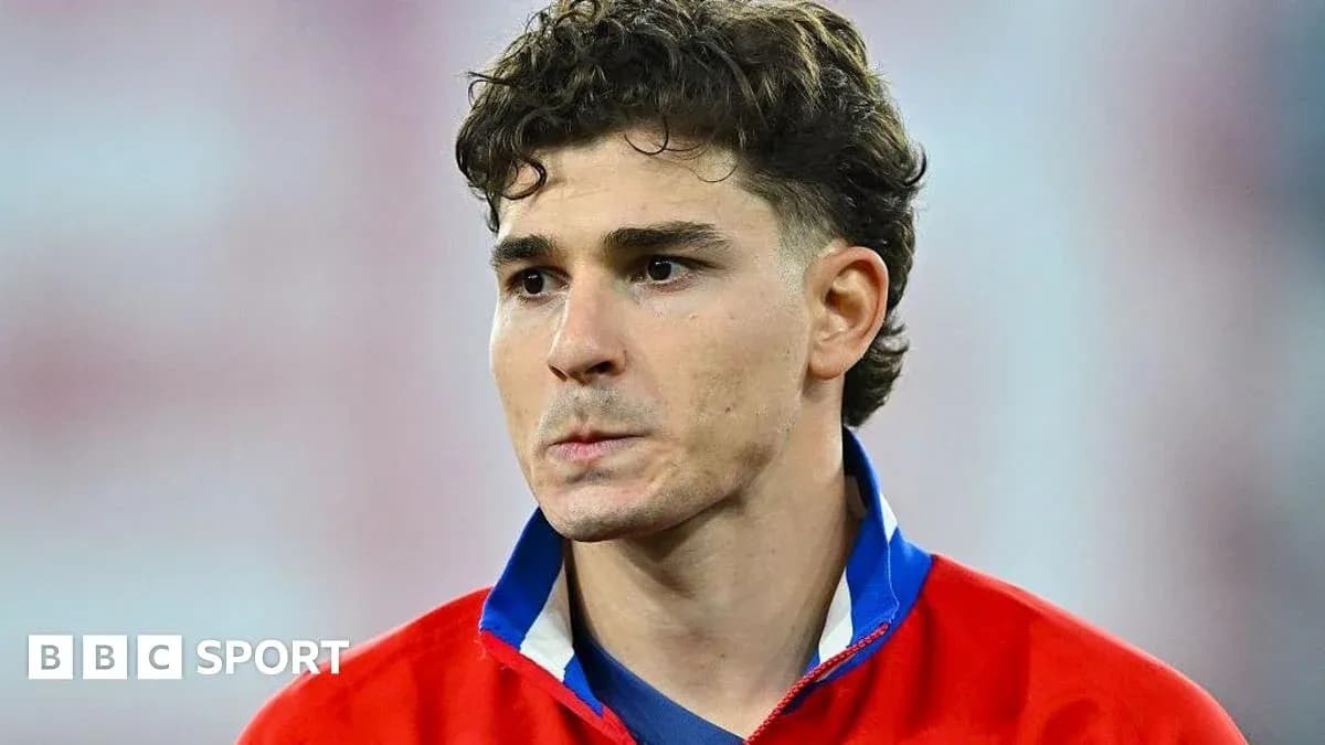 Player in national team jersey during match preparation Player in national team jersey during match preparation