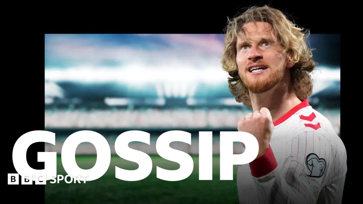 Player celebrating with a clenched fist on pitch Player celebrating with a clenched fist on pitch