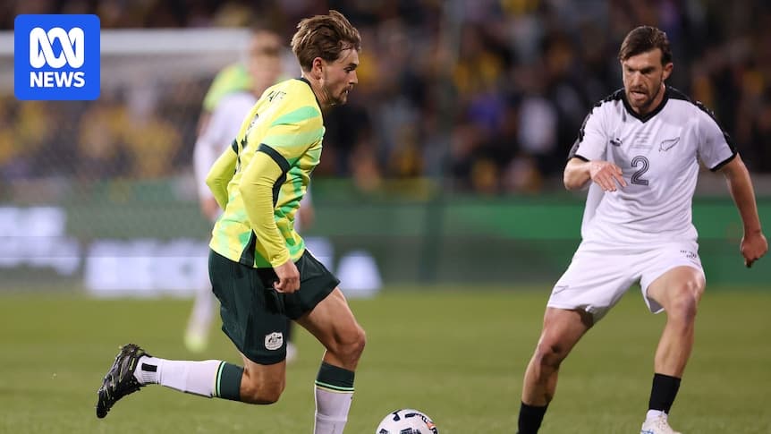 Player dribbling the ball during Australia vs New Zealand match Player dribbling the ball during Australia vs New Zealand match