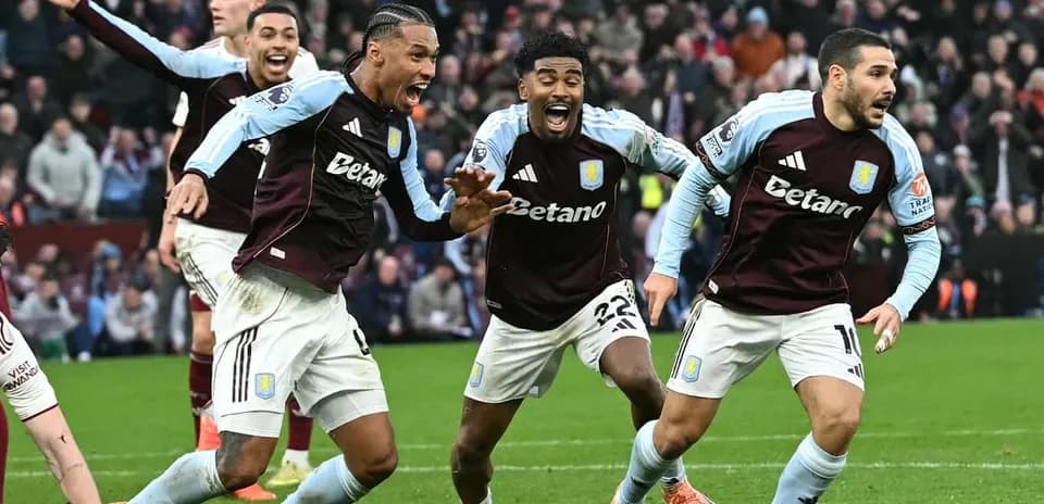 Aston Villa players celebrating a goal Aston Villa players celebrating a goal