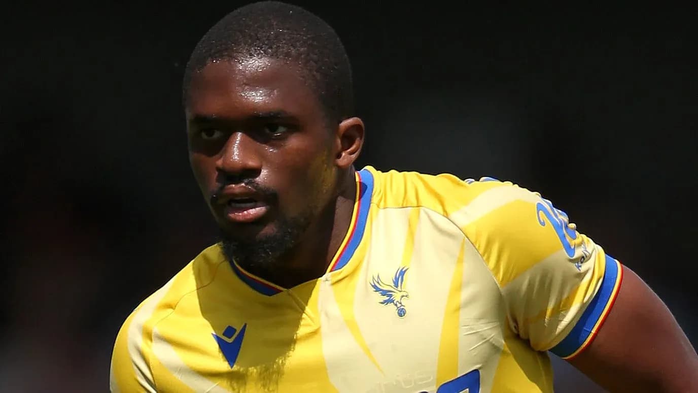 Player in yellow jersey during a match Player in yellow jersey during a match