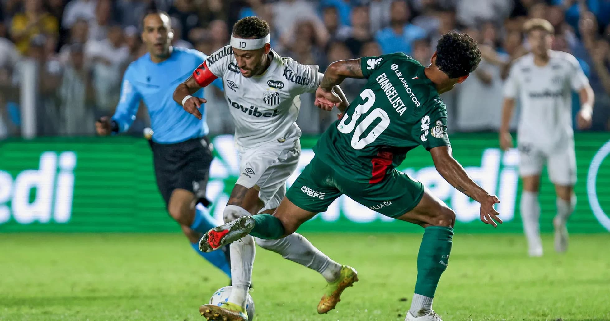 Player dribbling past opponent during soccer match Player dribbling past opponent during soccer match