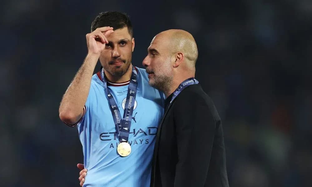Player and coach celebrating with medals after match Player and coach celebrating with medals after match