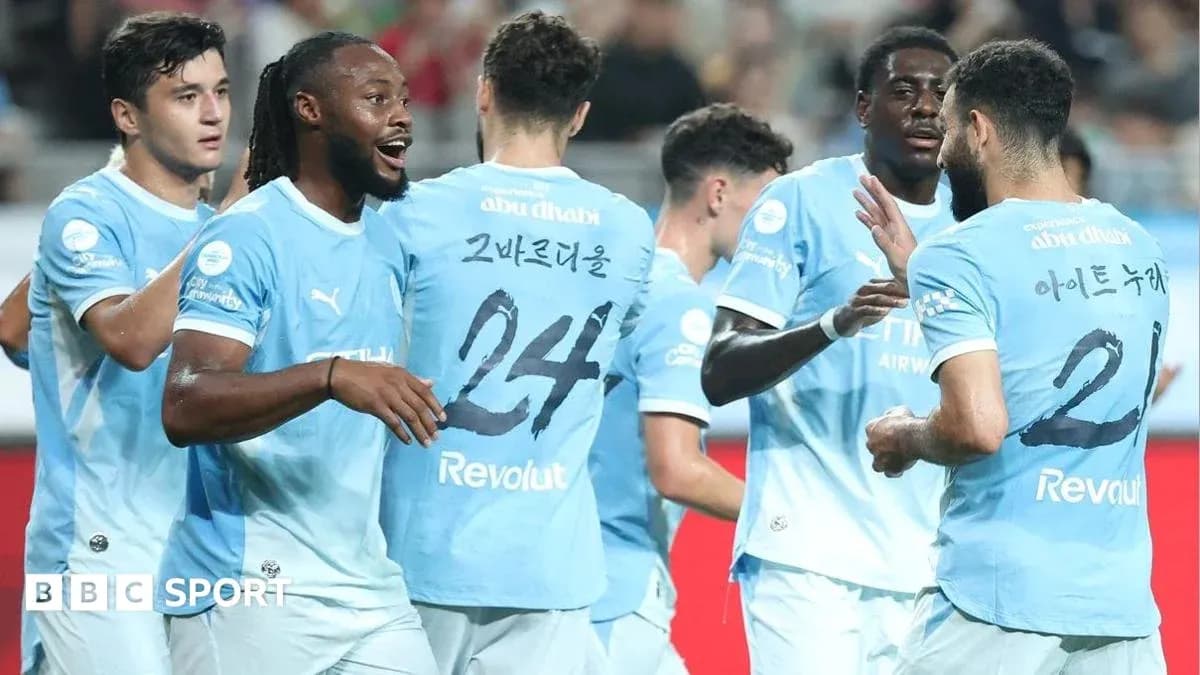 Players celebrating together during a match Players celebrating together during a match