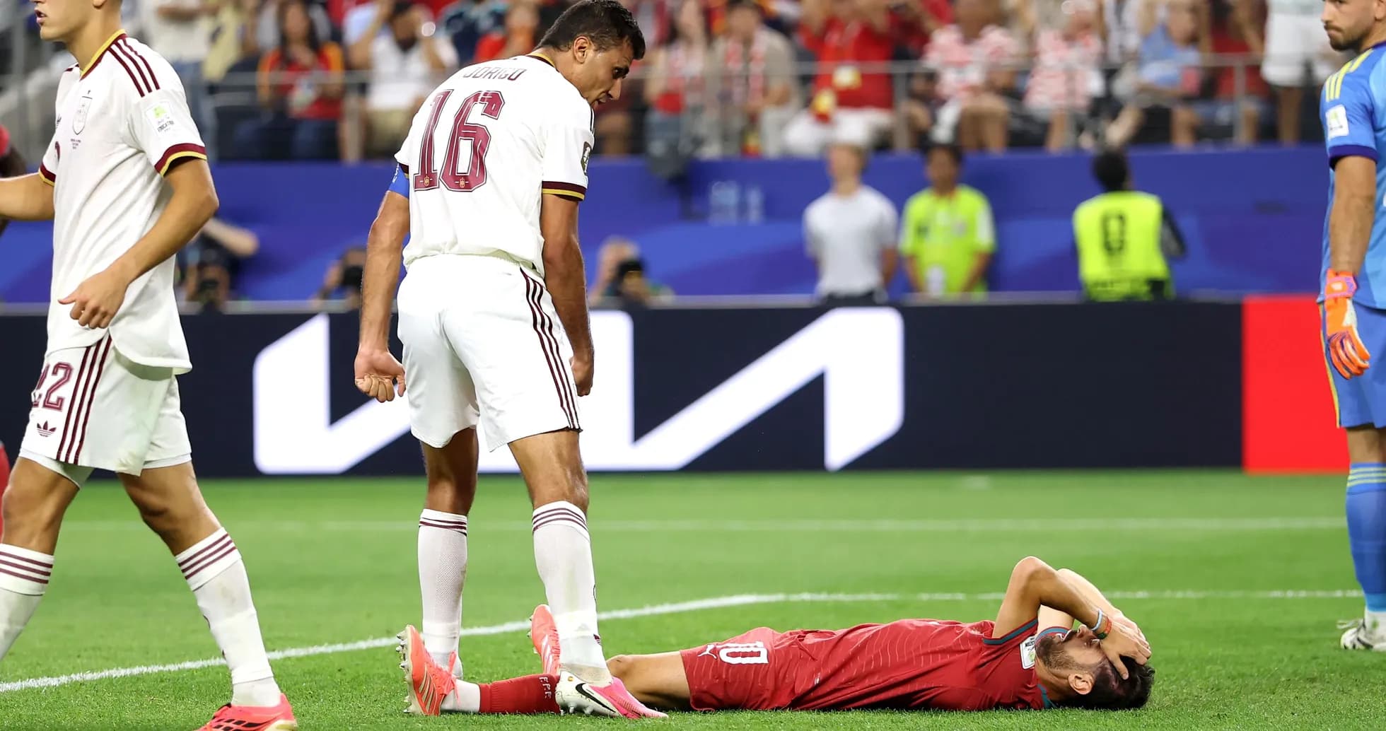 Player lying on the ground after a tackle Player lying on the ground after a tackle