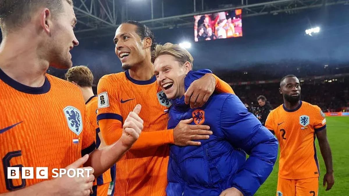 Players celebrating after a match in orange uniforms Players celebrating after a match in orange uniforms