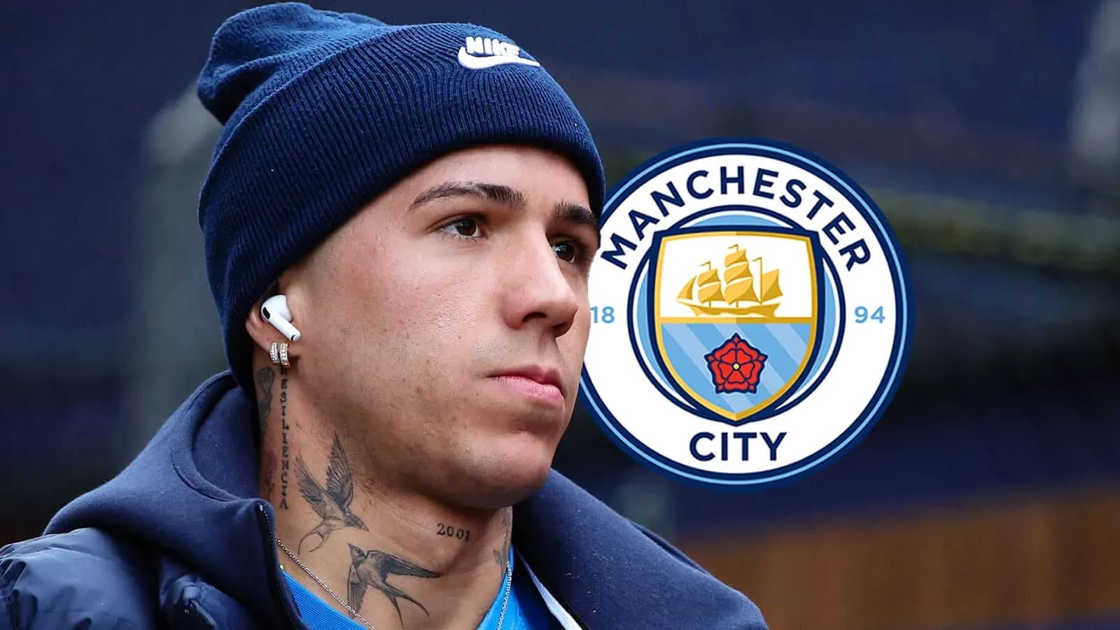 Player wearing headphones next to Manchester City logo Player wearing headphones next to Manchester City logo