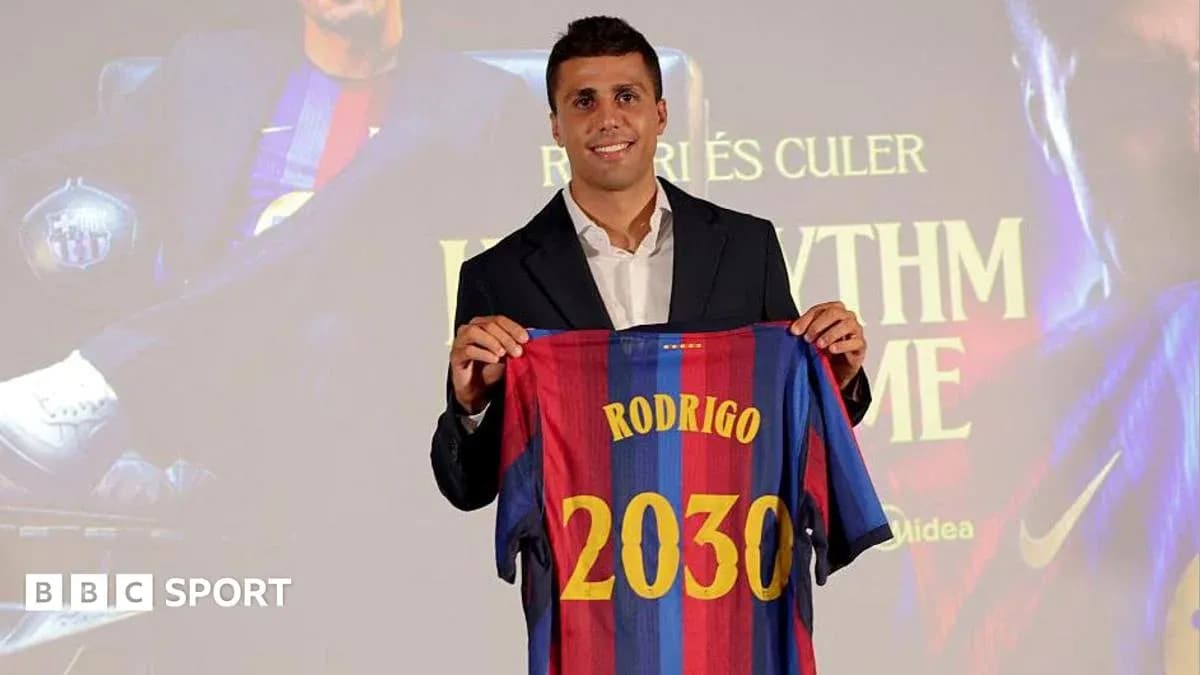 Player holding Barcelona jersey with name and number Player holding Barcelona jersey with name and number