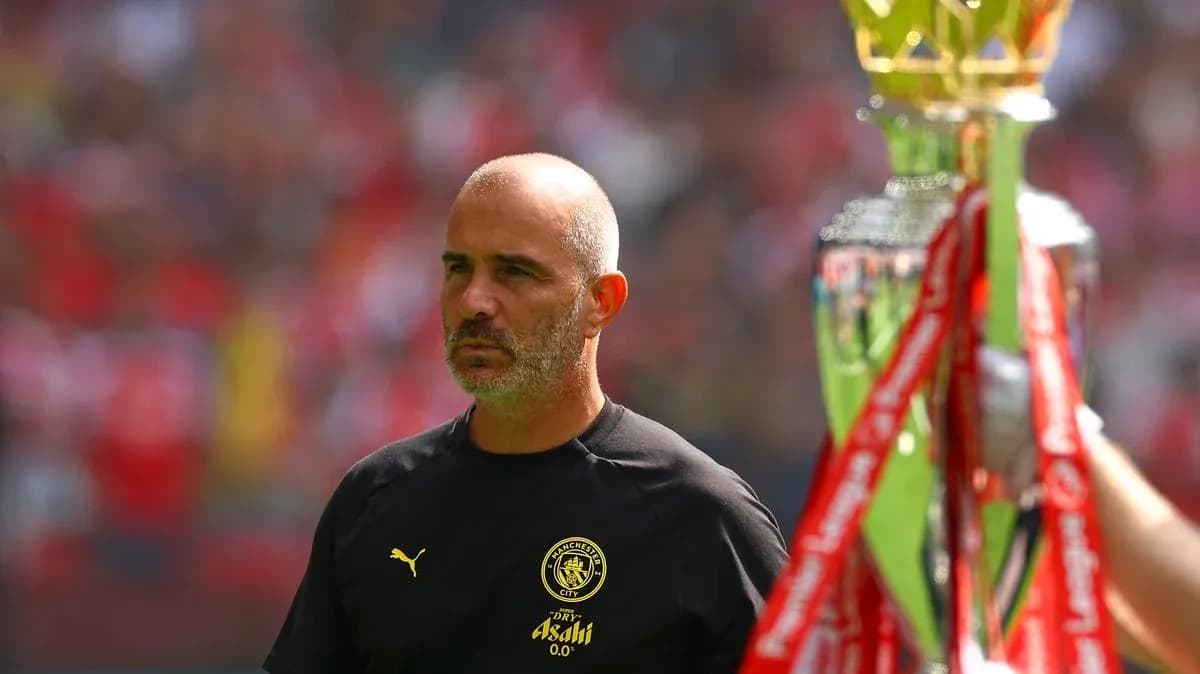 Coach observing trophy presentation during match Coach observing trophy presentation during match
