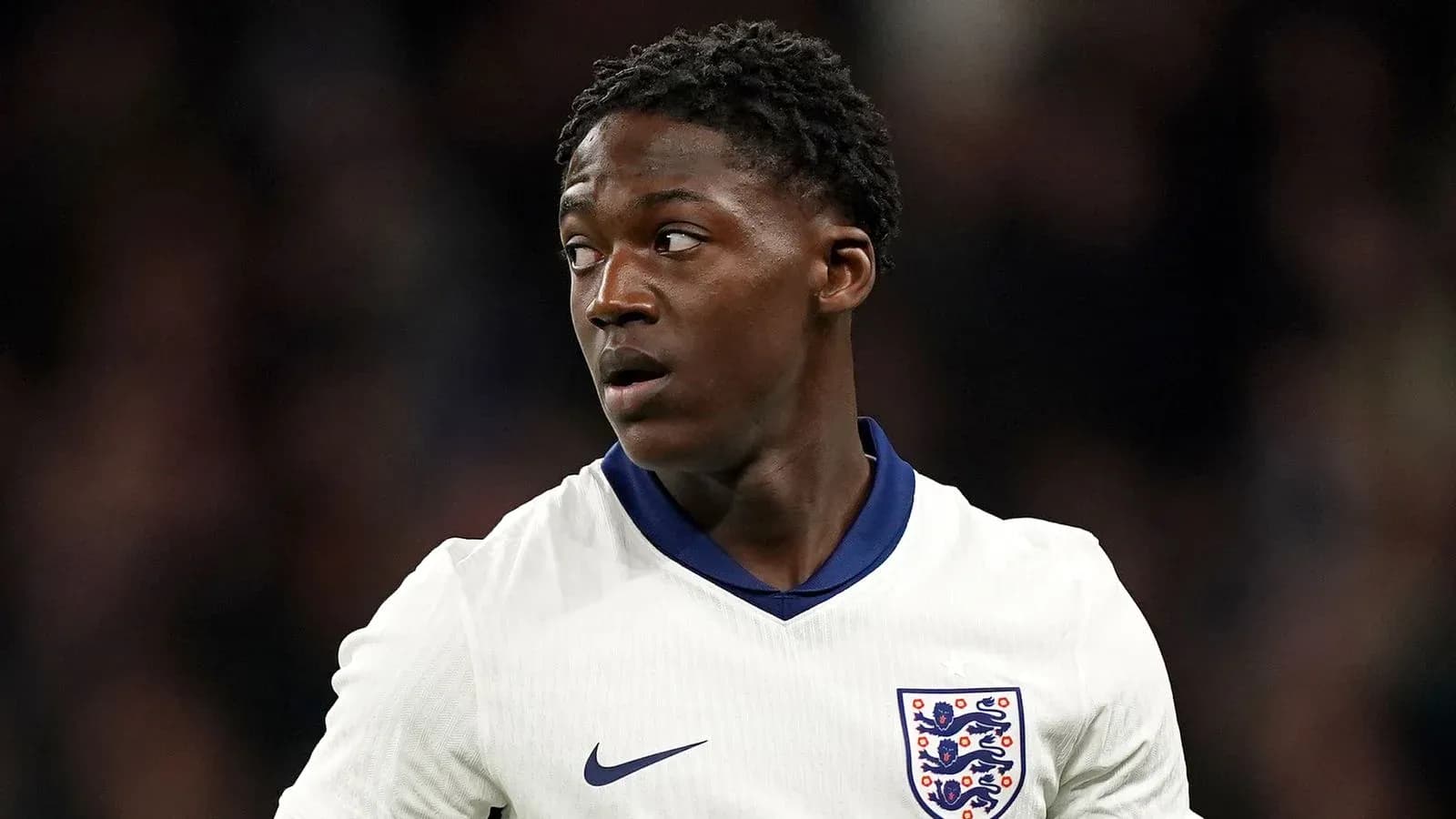 Football player in England kit during match Football player in England kit during match