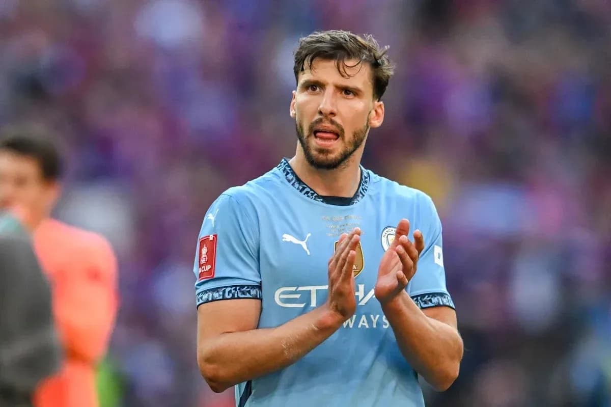 Player in light blue jersey applauding fans Player in light blue jersey applauding fans