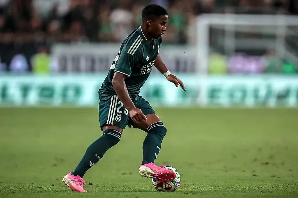 Player dribbling the ball during a match Player dribbling the ball during a match