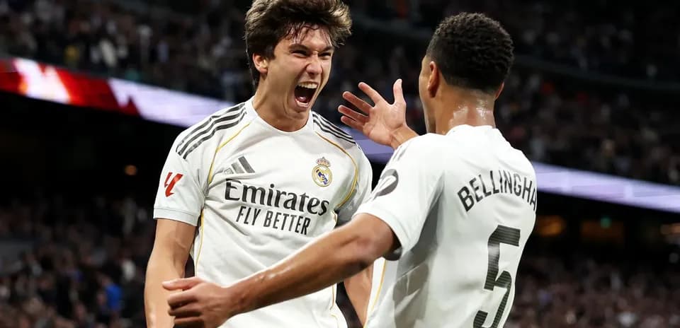 Real Madrid players celebrating a goal Real Madrid players celebrating a goal