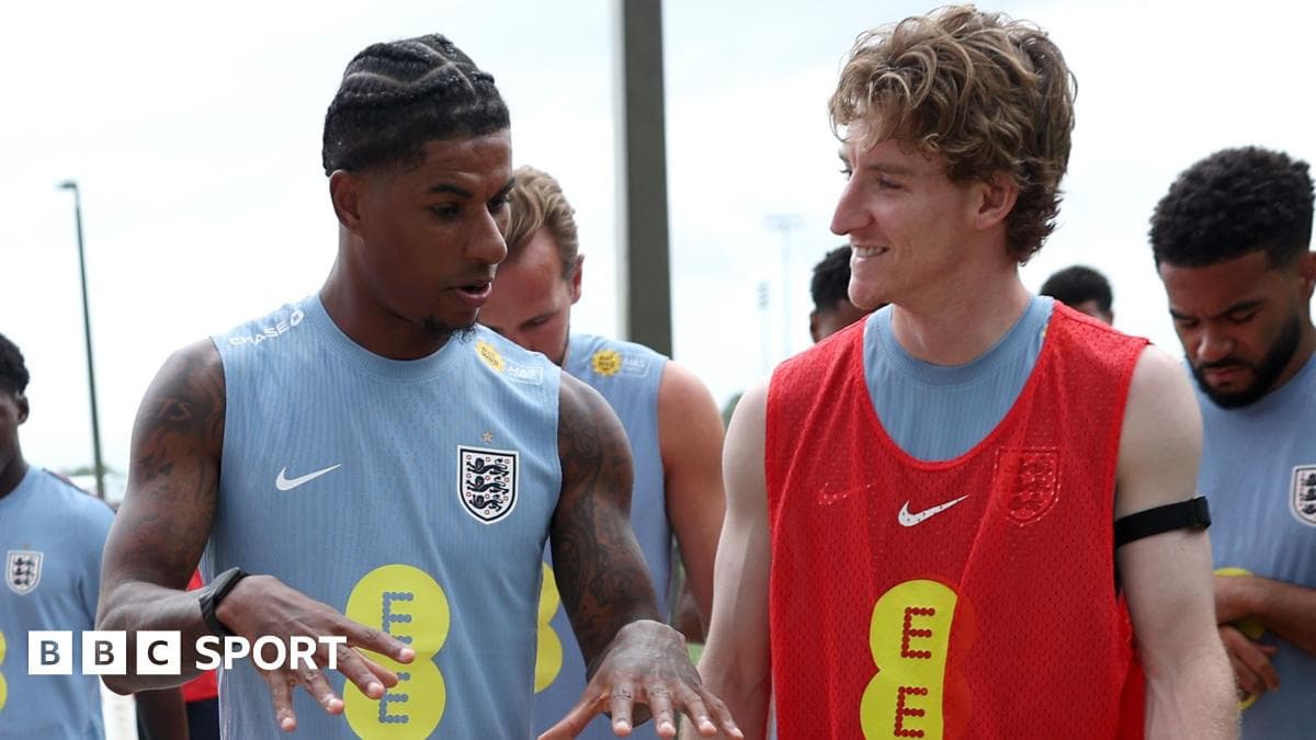 Two players discussing during England training session Two players discussing during England training session