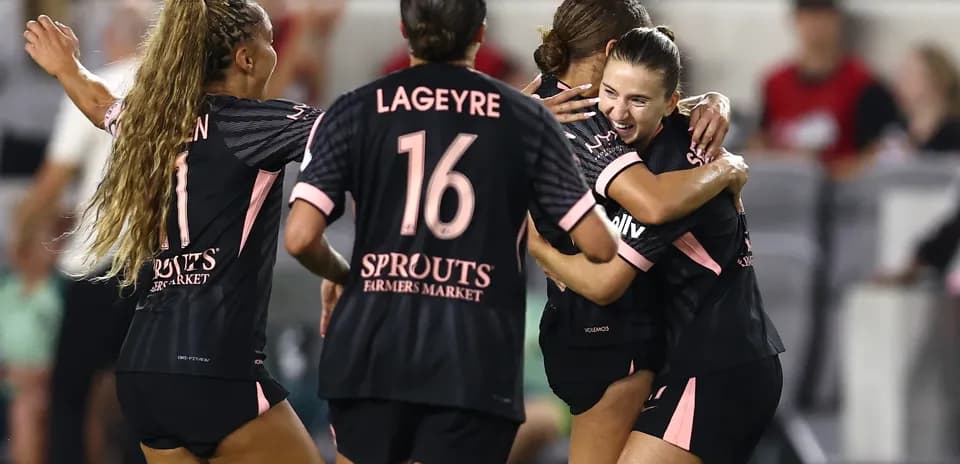Players celebrating a goal during NWSL match Players celebrating a goal during NWSL match