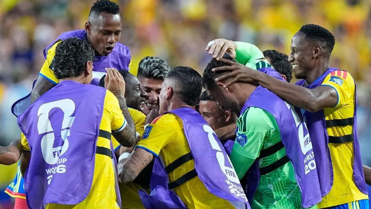 Players celebrating together after scoring a goal Players celebrating together after scoring a goal