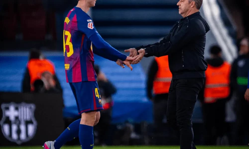 Player and coach shaking hands on the field Player and coach shaking hands on the field