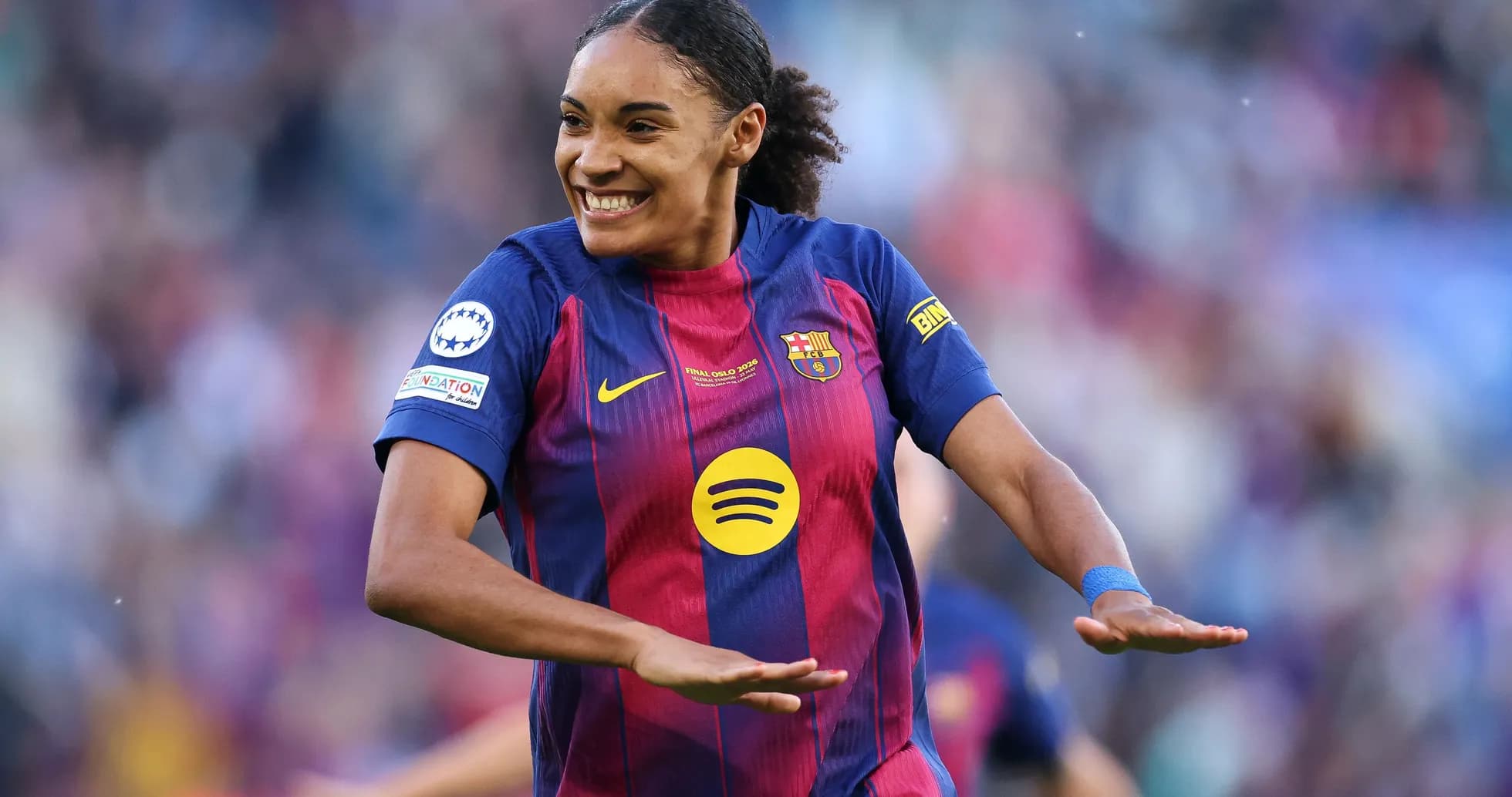 Barcelona player celebrating a goal on the pitch Barcelona player celebrating a goal on the pitch