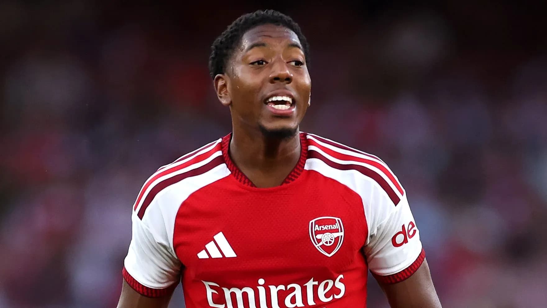 Arsenal player celebrating during a match Arsenal player celebrating during a match