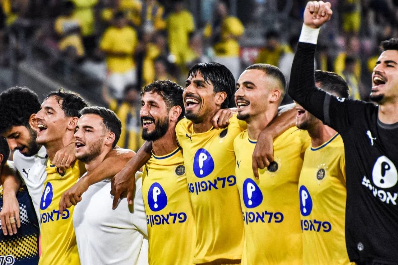 Maccabi Tel Aviv players celebrating after victory Maccabi Tel Aviv players celebrating after victory
