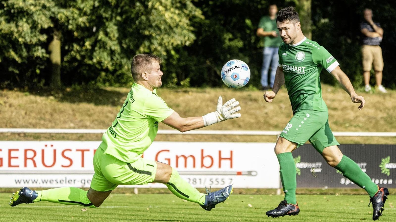 Goalkeeper saving the ball during football match Goalkeeper saving the ball during football match
