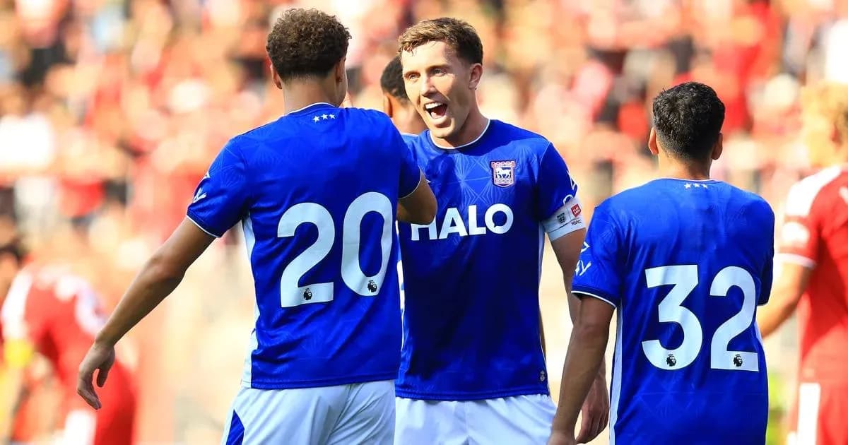 Players celebrating a goal during a match Players celebrating a goal during a match