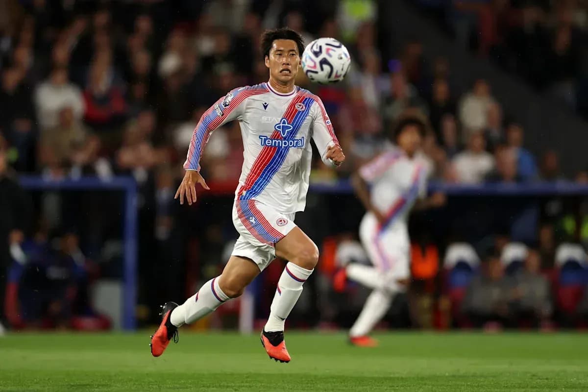 Player running with the ball during a match Player running with the ball during a match