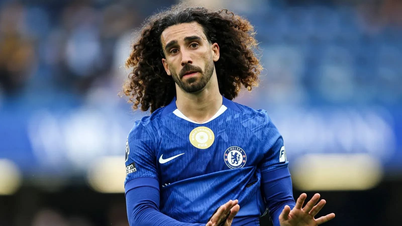 Player in blue Chelsea kit on the pitch Player in blue Chelsea kit on the pitch