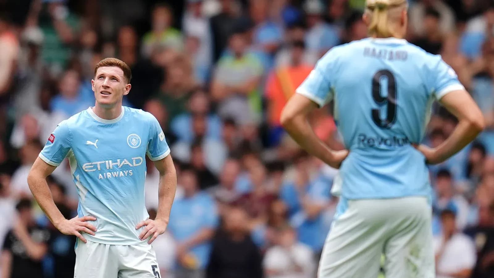 Manchester City players on field during match Manchester City players on field during match