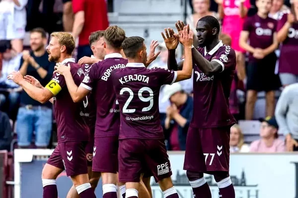 Heart of Midlothian players celebrating a goal Heart of Midlothian players celebrating a goal