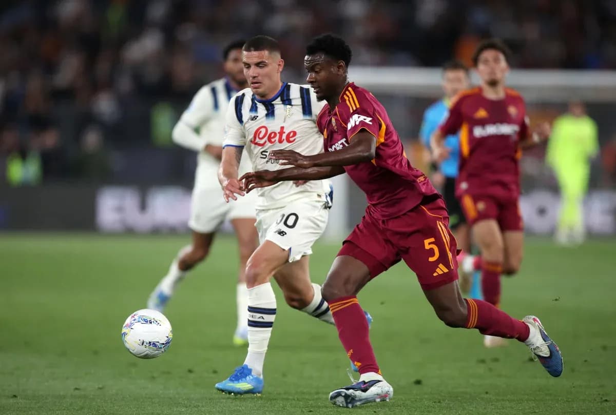 AS Roma player battling for the ball AS Roma player battling for the ball