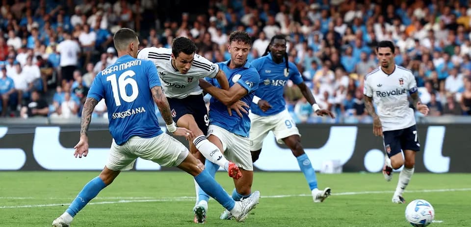 Players competing for the ball during Napoli match Players competing for the ball during Napoli match