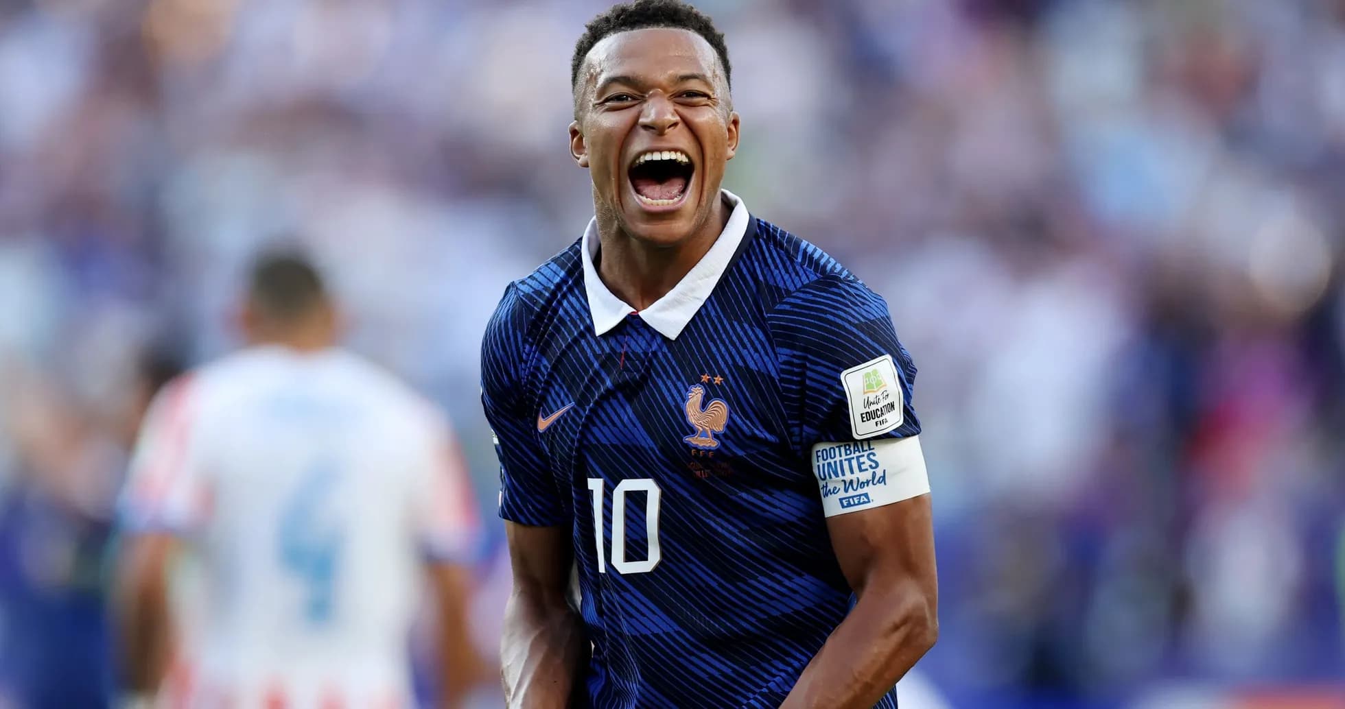 Player celebrating with a loud cheer during match Player celebrating with a loud cheer during match