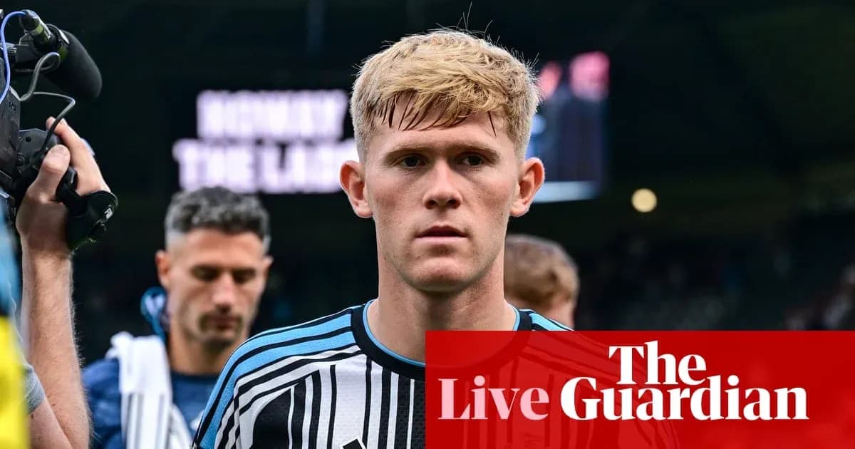 Player walking off pitch after match with teammates Player walking off pitch after match with teammates