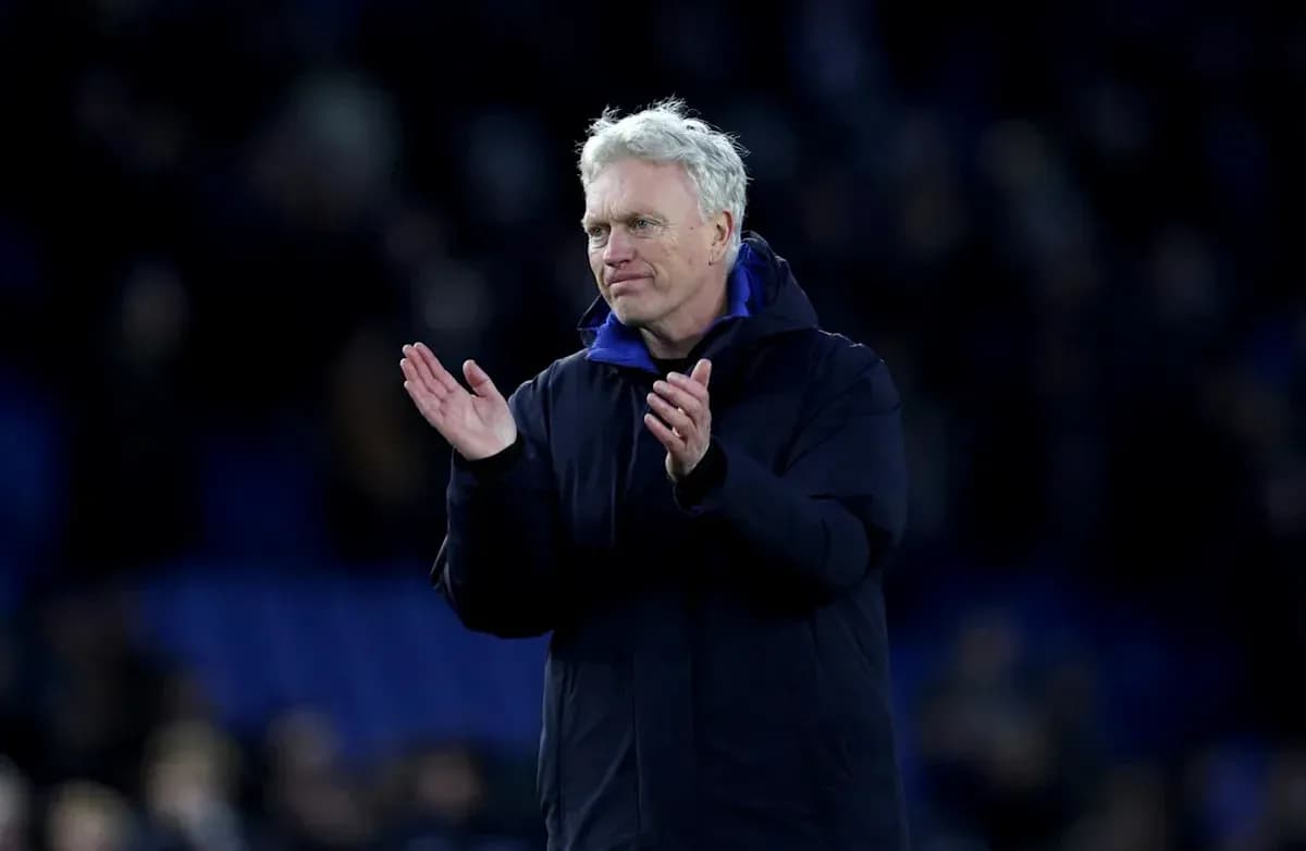 Manager applauding fans after the match Manager applauding fans after the match