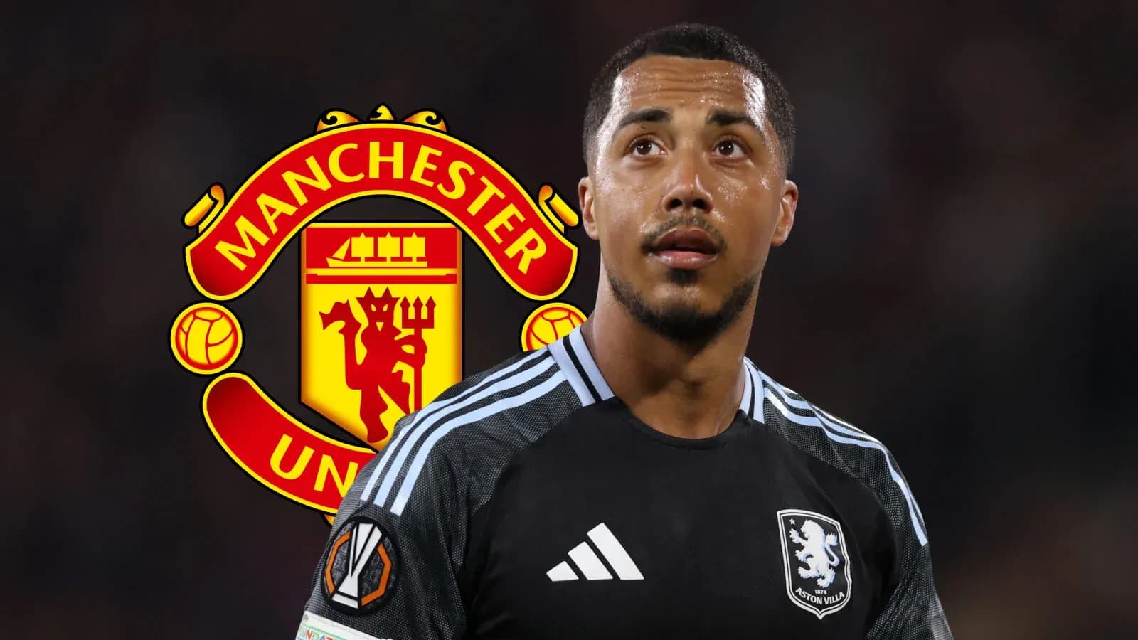 Aston Villa player with Manchester United logo backdrop Aston Villa player with Manchester United logo backdrop