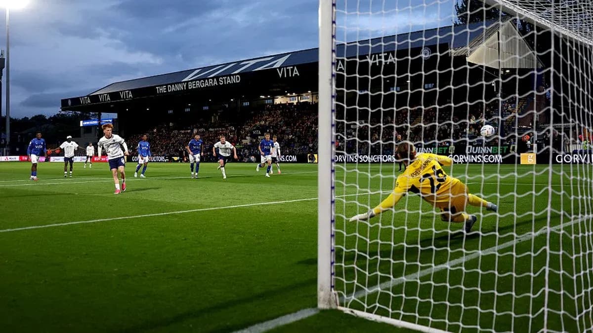 Player taking a penalty kick during football match Player taking a penalty kick during football match