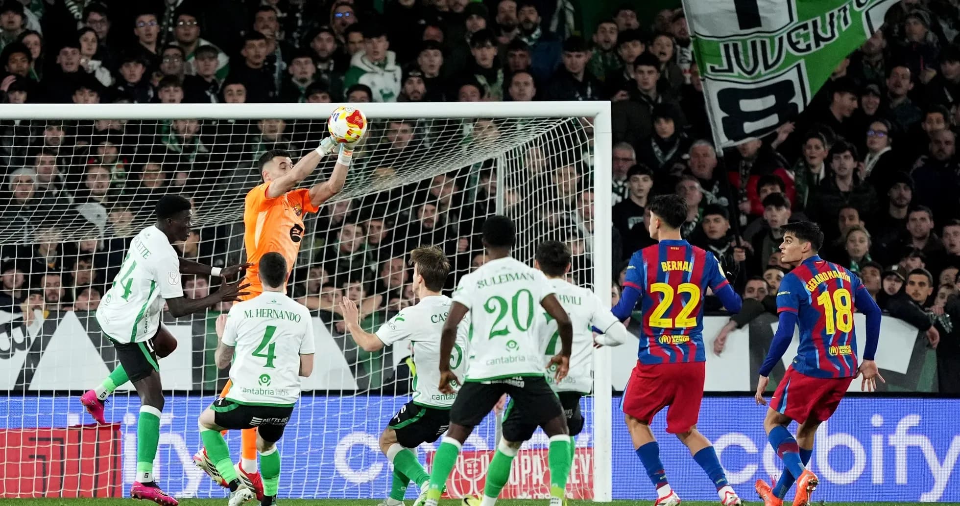 Goalkeeper making a save during a match Goalkeeper making a save during a match