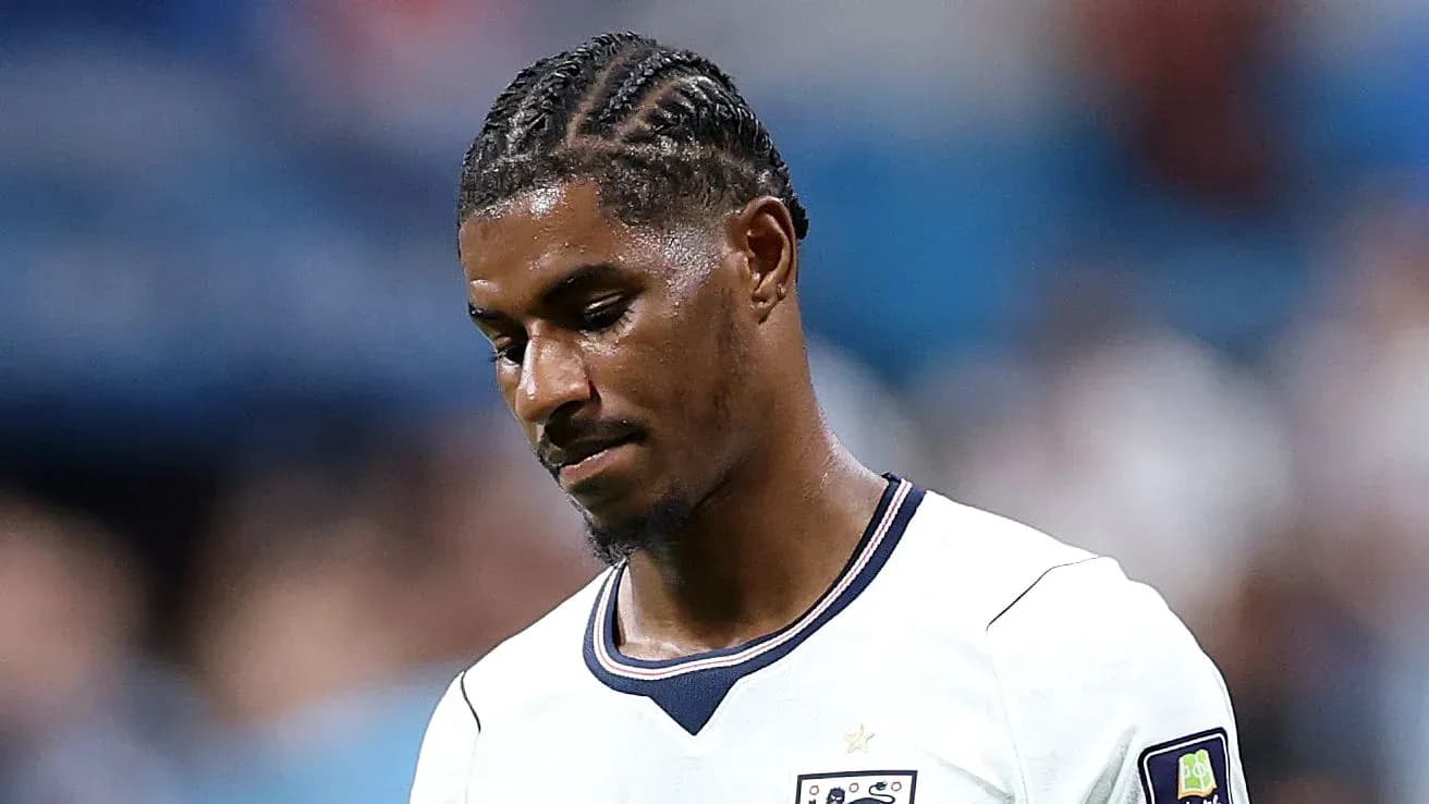 Player looking down during a football match Player looking down during a football match