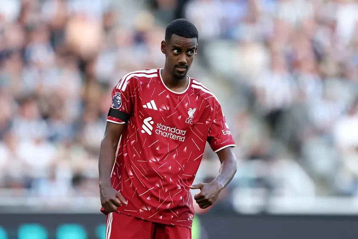 Player in Liverpool kit gestures during match Player in Liverpool kit gestures during match