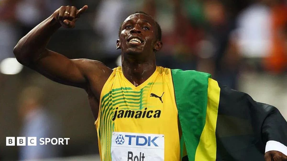 Athlete celebrating victory with Jamaica flag Athlete celebrating victory with Jamaica flag