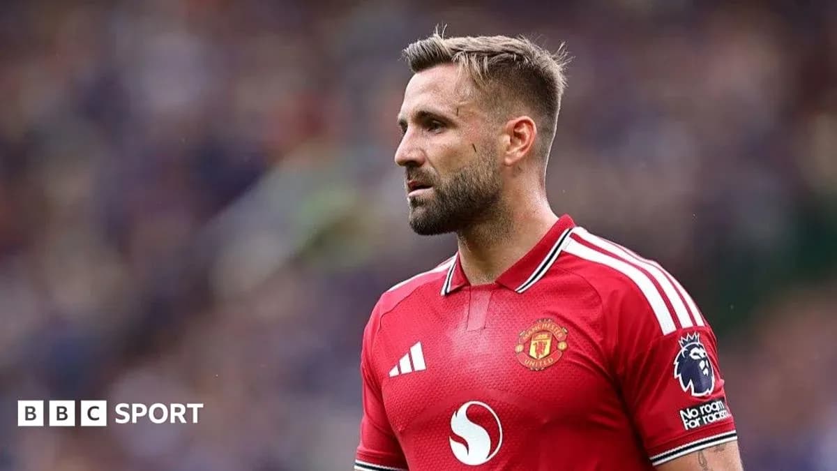 Player in red Manchester United jersey during match Player in red Manchester United jersey during match