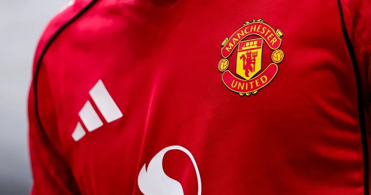 Close-up of Manchester United jersey with logo Close-up of Manchester United jersey with logo