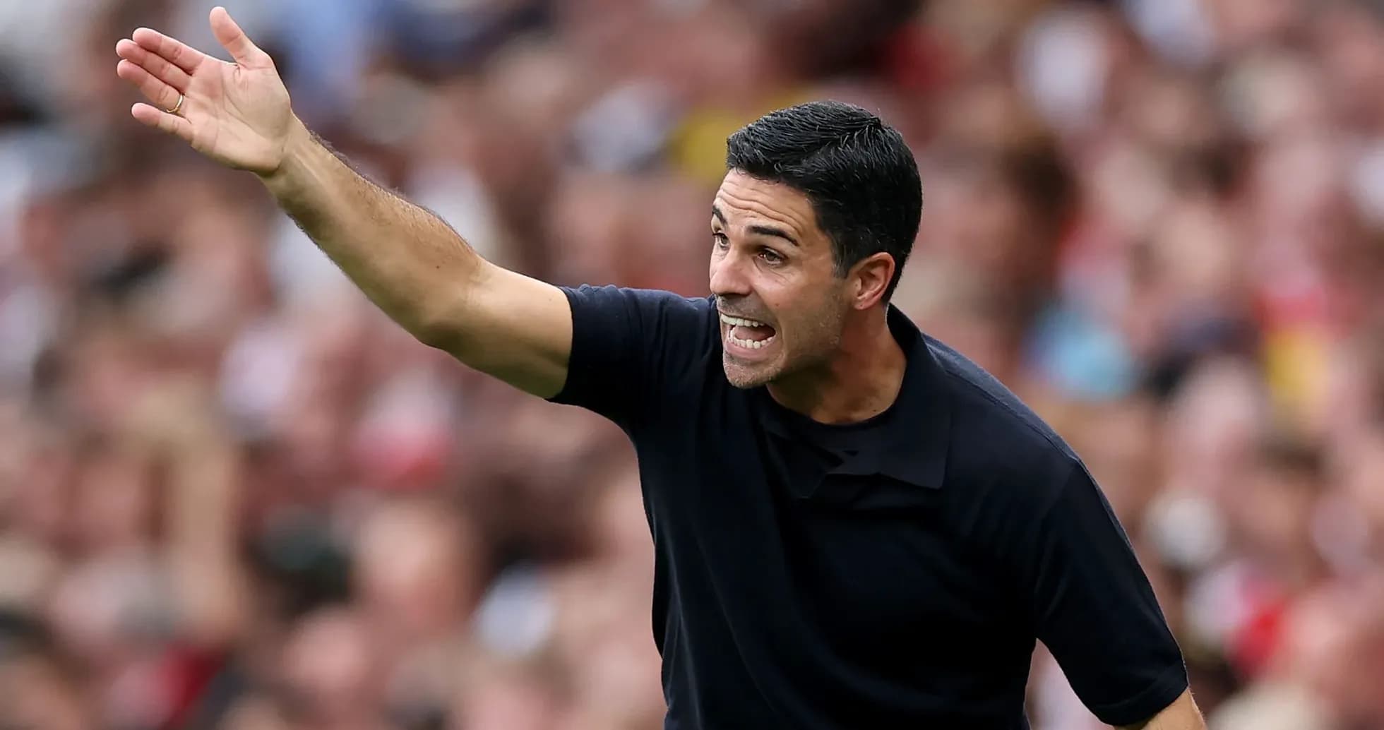 Manager gesturing during a match on the sidelines Manager gesturing during a match on the sidelines