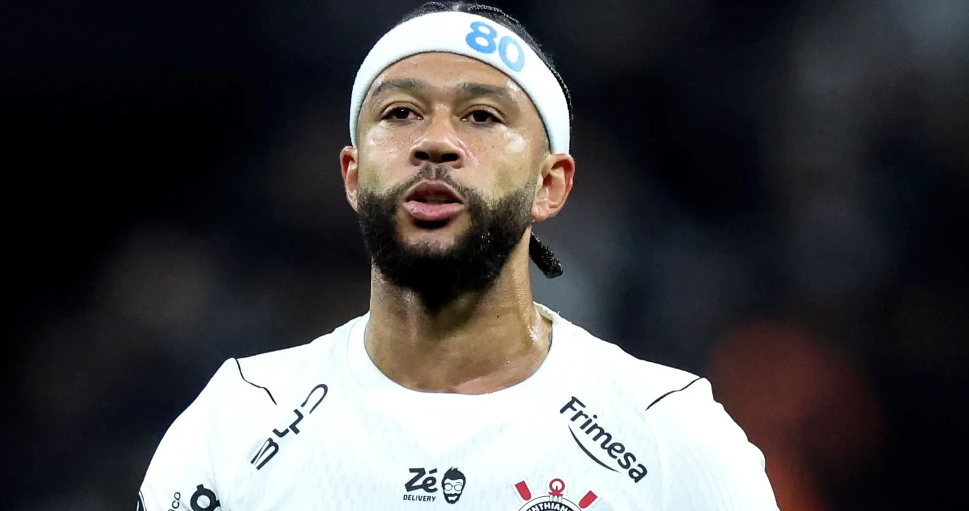 Player in white jersey during match action Player in white jersey during match action